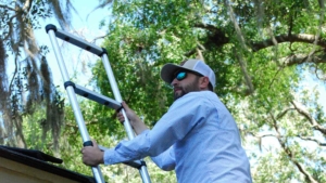 Max Parigi performing a roof inspection